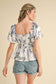 EXCLUSIVE PRINT FLORAL PEPLUM WAIST TOP