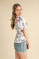 EXCLUSIVE PRINT FLORAL PEPLUM WAIST TOP