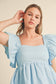 RUFFLED FLUTTER SLEEVE BABYDOLL TOP