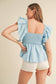 RUFFLED FLUTTER SLEEVE BABYDOLL TOP