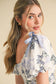 EXCLUSIVE PRINT FLORAL PEPLUM WAIST TOP